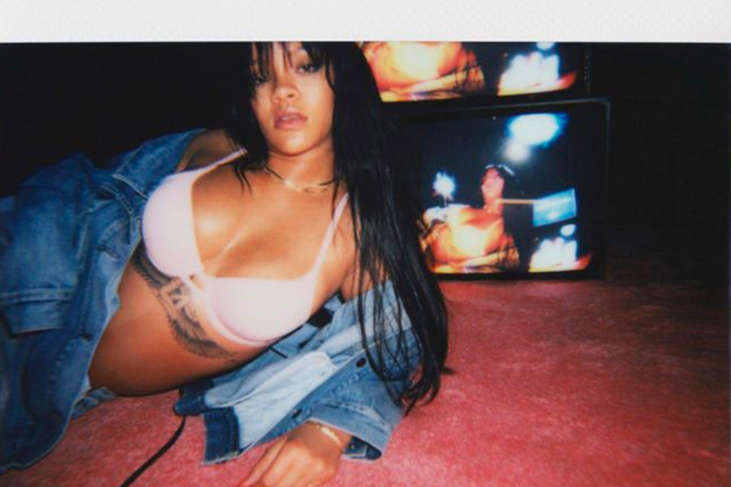 Rihanna lying down the floor