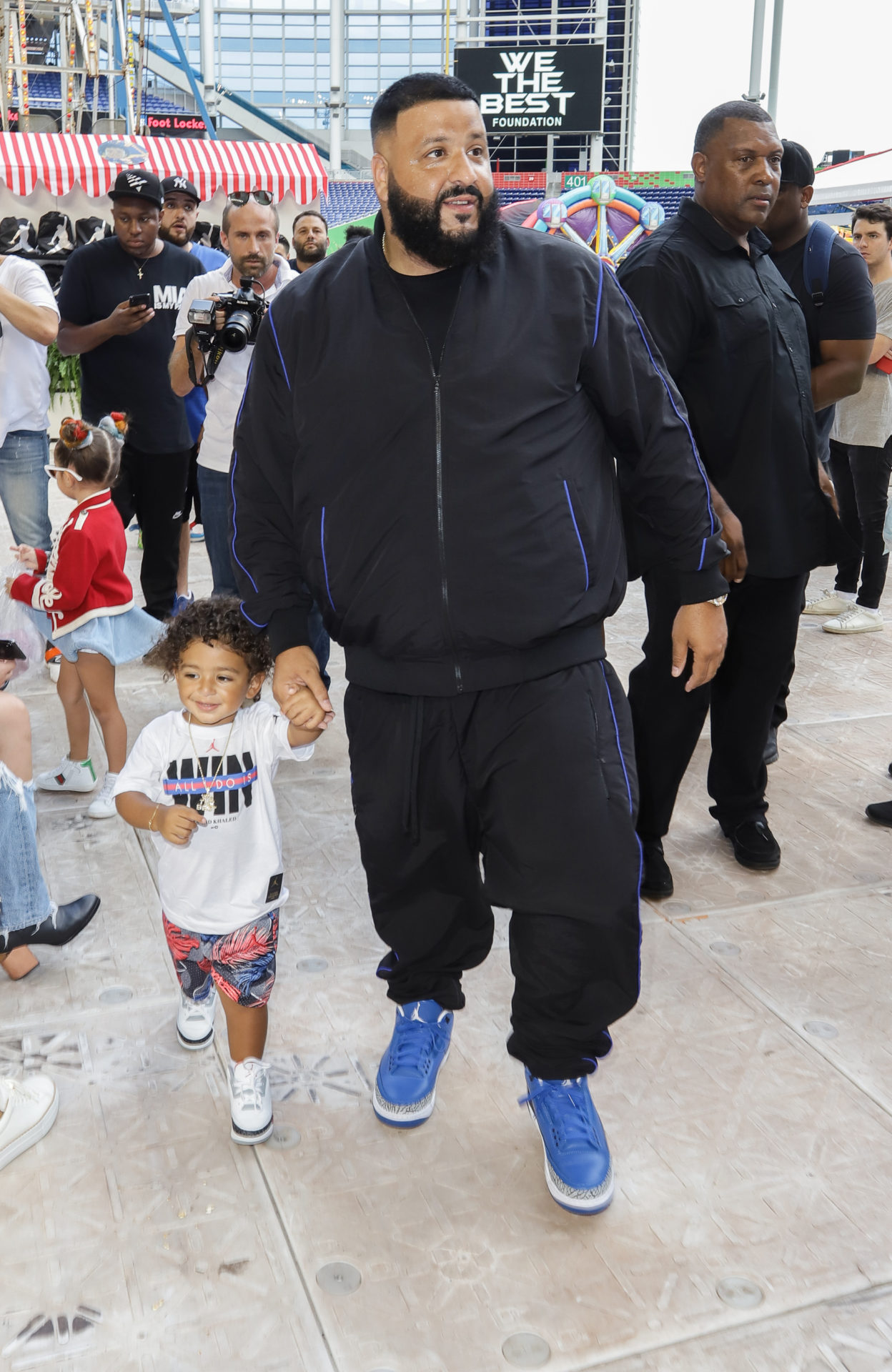 DJ KHALED holding his kid's hand