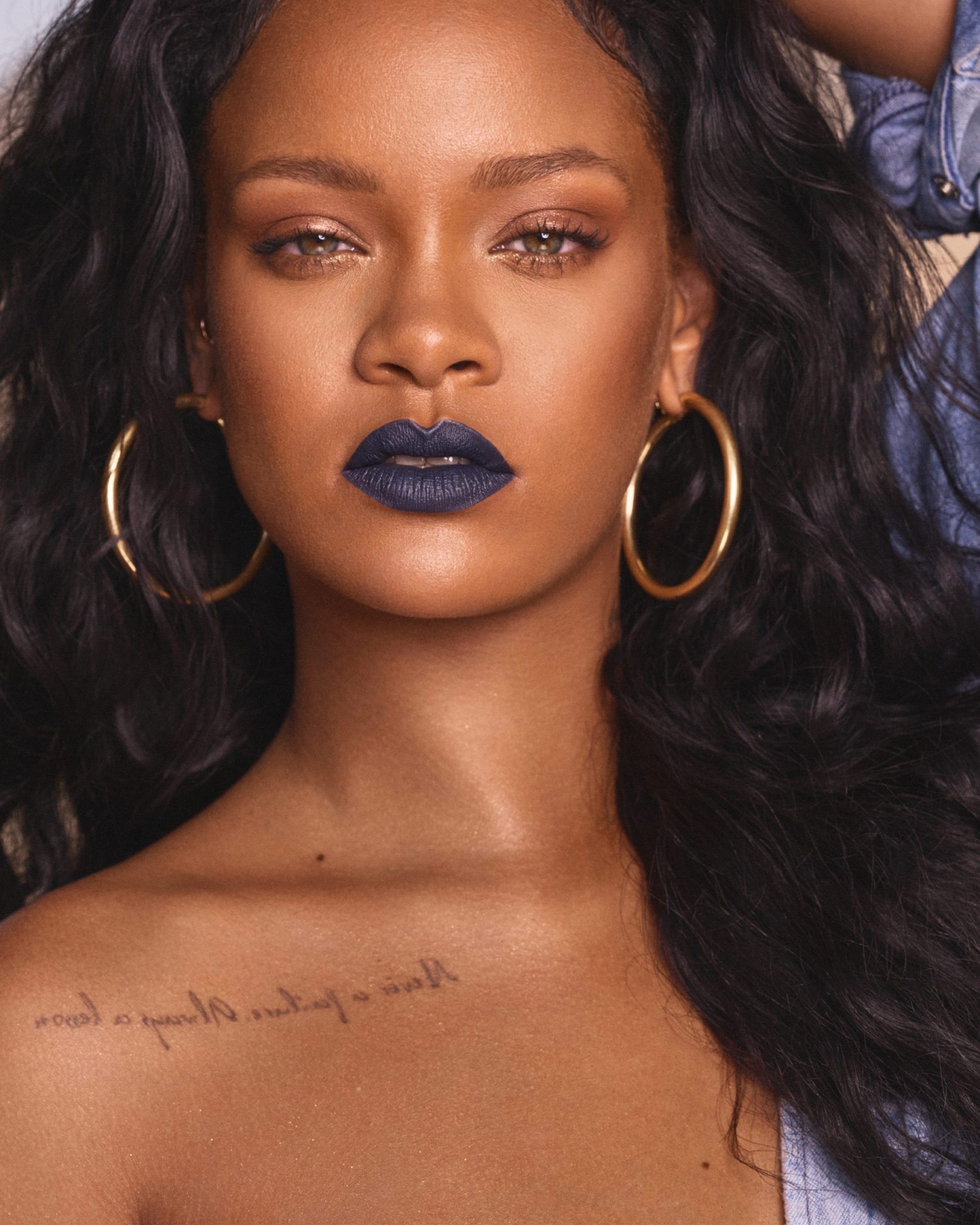 Rihanna with dark blue lipstick