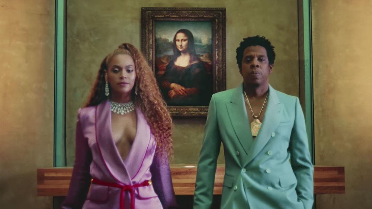 Beyonce and Jay-Z in front of Mona Lisa