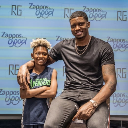 Rudy Gay with a kid